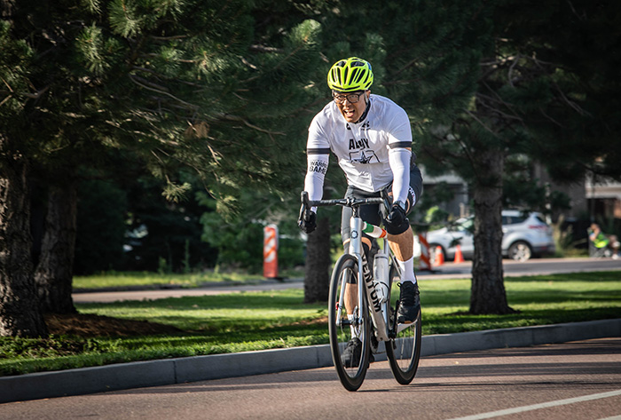 U.S. Army Sgt.1st Class David Hong races through the course during the cycling competition in the 2025 DoD Warrior Games, Colorado Springs, Colorado.
